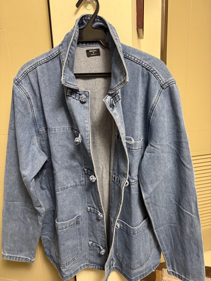 Bench Chongsan His & Hers Denim Jackets Size M & L (Category: Coats, Jackets and Outerwear) located in Pasig City. Submitted by davedeleon (Listing ID 1470309442, Image 1). Description: His & Hers Denim Jacket sold per piece - Brand: Bench - Size: Large and Medium - Color: Light wash blue - Fit: Relaxed fit style - Closure: Traditional Chinese knot frog buttons - Collar: Mandarin collar - Pockets: Multiple utility pockets on chest and lower front