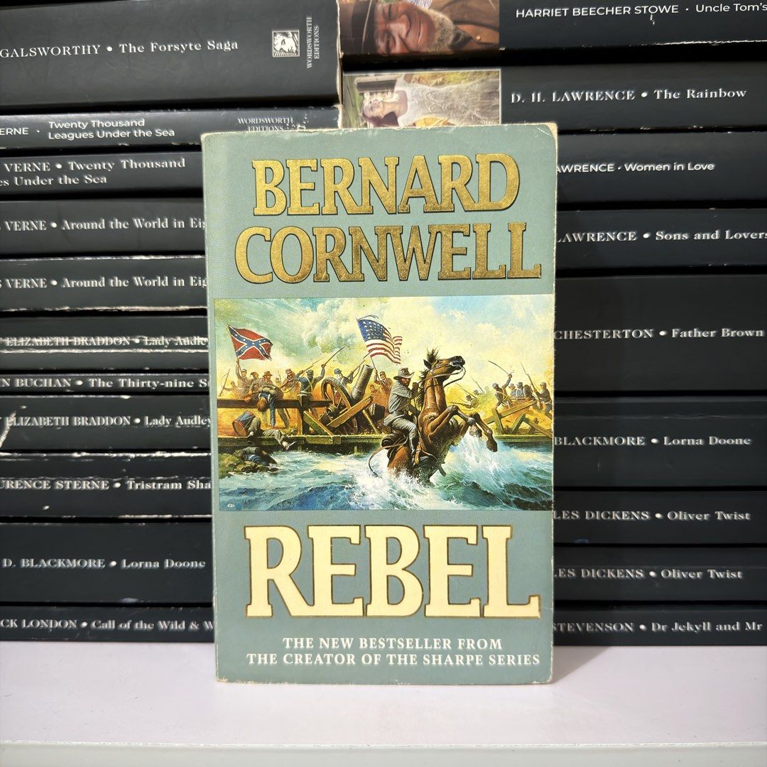 Bernard Cornwell Rebel Paperback Novel (Category: Storybooks) located in Lingayen. Submitted by readwjane (Listing ID 1470199987, Image 1). Description: - Title: Rebel by Bernard Cornwell - Format: Paperback with classic battle cover art - Genre: Historical fiction / Military history / Civil War - Condition: Spine has minor wear from reading/storage; pages are clean and fully intact - Size: Standard paperback.