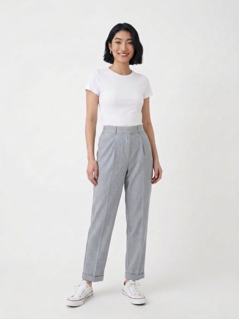 Bershka Grey Trousers Size M (Category: Jeans) located in Santa Rosa. Submitted by thrifty_bev (Listing ID 1470293885, Image 1). Description: - Brand: Bershka - Size: Medium (M) - Color: Clean light grey - Design: High-waisted with pleated front and turned-up hem cuffs - Comfort: Elastic waistband at the back - Pockets: Two back pockets included - Origin: Made in Turkey - Condition: Excellent, versatile for casual or office wear.