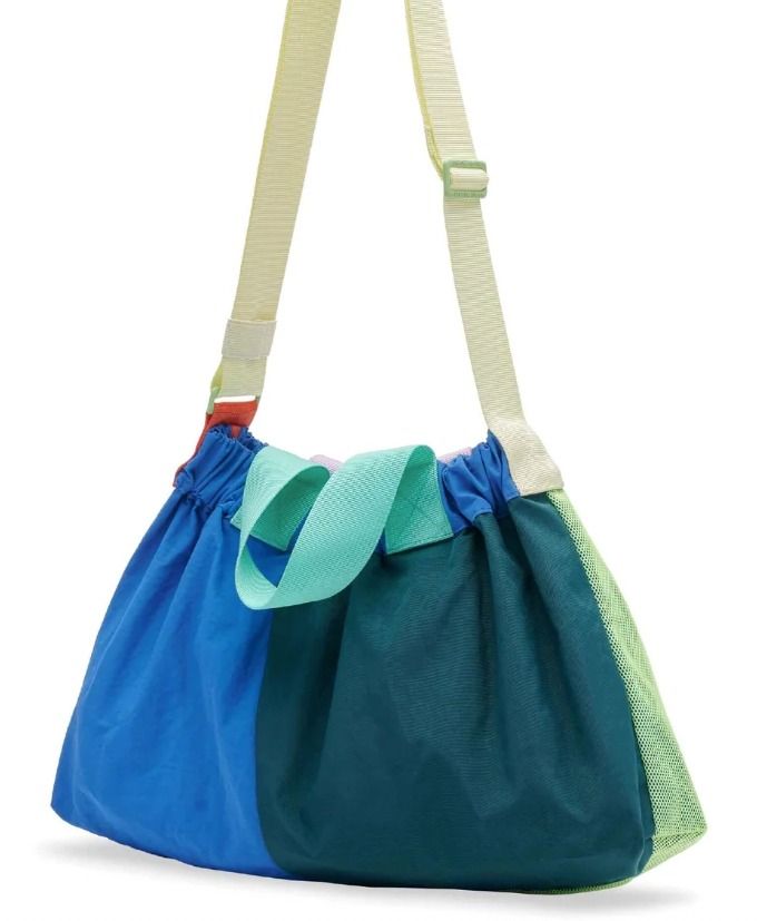 Beyond The Vines - Super Panelled XS Dumpling Bag (Category: Shoulder Bags) located in San Fernando. Submitted by despicadaaaale (Listing ID 1470332493, Image 3). Description: - Used 2x - RFS - Too many bags - Authentic Beyond The Vines multi-color shoulder bag - Vibrant colorblock design featuring blue, green mesh side panels, pink accents, and light purple top handles - Bright orange front pocket with white brand text printed near the bottom - 