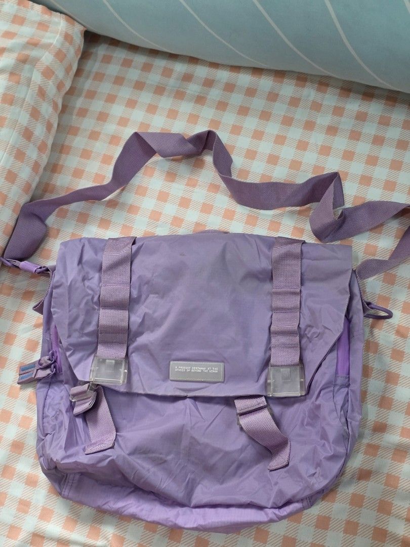 Beyond The Vines ParaSatchel 001 Lavender Backpack (Category: Backpacks) located in Antipolo. Submitted by pinkpandascloset (Listing ID 1470257980, Image 3). Description: - Brand: Beyond The Vines - Model: ParaSatchel 001 - Color: Lavender - Condition: needs wash - Material: Lightweight ripstop nylon (290g) - Capacity: 12L - Dimensions: H40.5 x W34 x D5 cm - Features: Front vertical zipper pocket, top handle, adjustable shoulder straps, and brand