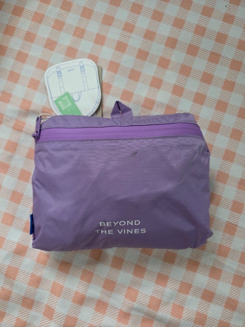 Beyond The Vines ParaSatchel 001 Lavender Backpack (Category: Backpacks) located in Antipolo. Submitted by pinkpandascloset (Listing ID 1470257980, Image 2). Description: - Brand: Beyond The Vines - Model: ParaSatchel 001 - Color: Lavender - Condition: needs wash - Material: Lightweight ripstop nylon (290g) - Capacity: 12L - Dimensions: H40.5 x W34 x D5 cm - Features: Front vertical zipper pocket, top handle, adjustable shoulder straps, and brand