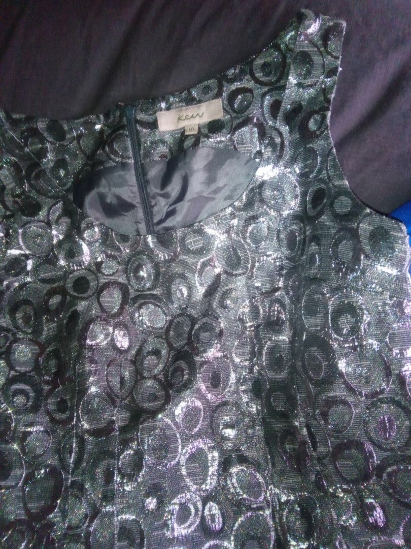 Black & Silver Patterned Sleeveless Mini Dress 🖤 (Category: Dresses) located in Manila. Submitted by fabelz (Listing ID 1470152309, Image 3). Description: Ken Black & Silver Patterned Sleeveless Dress 🖤✨ 💰 Price: ₱300 (negotiable) • Brand: Kew • Size: Medium to Large (M–L) • Color: Black and silver • Style: Sleeveless patterned dress • Condition: Brand new, never worn ✨ Features a unique circular pattern with a subtle shimmer, perfect for part