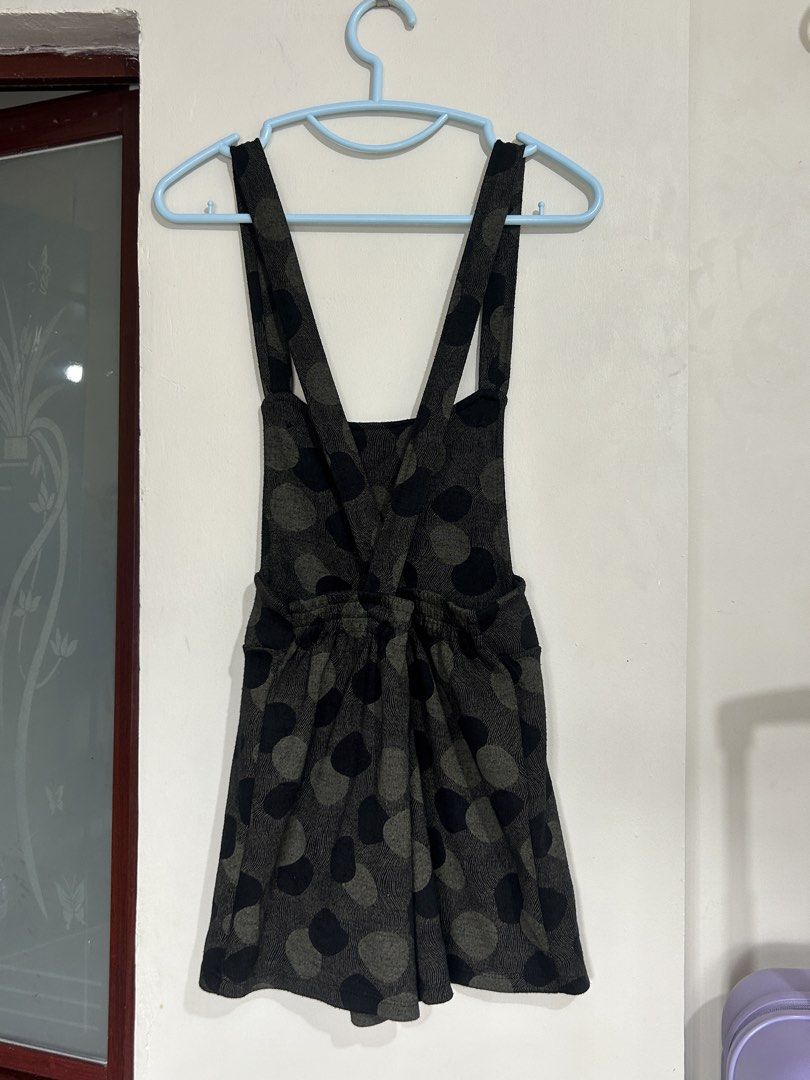 Black and Grey Polka Dot Overalls Romper (Category: Rompers) located in Pasig City. Submitted by eddwuhrd (Listing ID 1470167317, Image 2). Description: - Trendy dark grey and black polka dot design - Convenient button closures on front straps - Comfy elasticated waistline for a great fit - Lightweight fabric, perfect for warm weather - Short length and easy to style.