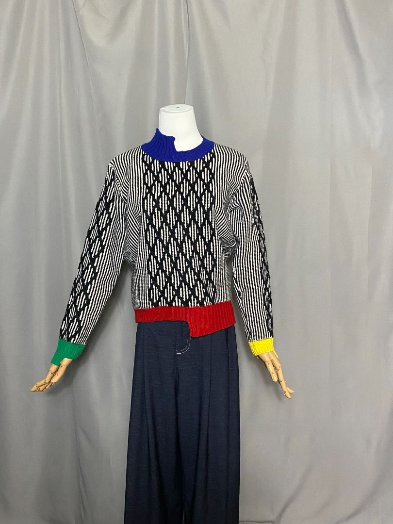 Black and white knitted sweater with multicolor hem (Category: Longsleeves) located in Las Pinas. Submitted by ipickyou (Listing ID 1470288262, Image 2). Description: Unwashed Condition: 10/10 𝗠𝗲𝗮𝘀𝘂𝗿𝗲𝗺𝗲𝗻𝘁𝘀 𝘄𝗵𝗲𝗻 𝗹𝗮𝗶𝗱 𝗳𝗹𝗮𝘁: -Shoulder to shoulder: 15 1/2” -Armpit to armpit: 17” -Length: 22” .