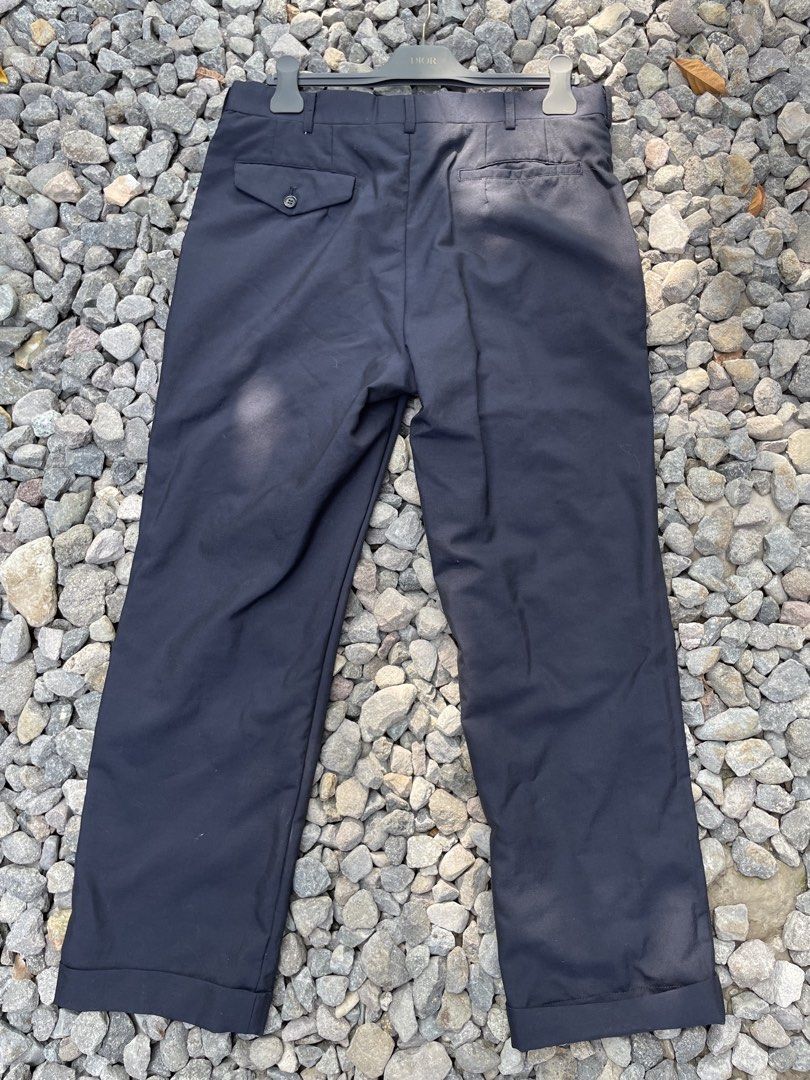 black cuffed hem buttoned back pocket belt loops concealed fastening (Category: Luxury Apparel) located in Davao. Submitted by lwky_thrift (Listing ID 1470333449, Image 2). Description: Comme des Garçons Homme Deux cuffed trousers Authentic Size: XL 185/100A Excellent Condition Details: black cuffed hem buttoned back pocket belt loops concealed fastening.