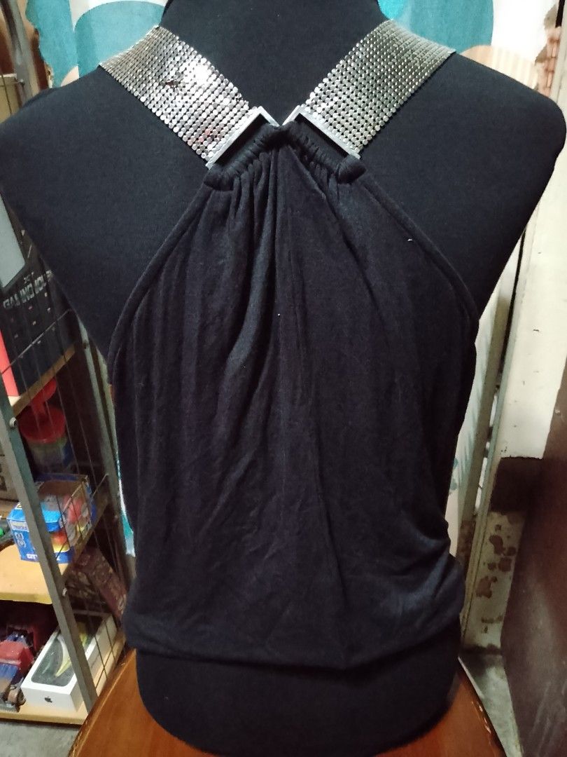 Black halter top with silver rhinestone straps (Category: Sleeveless) located in Batangas. Submitted by sheenx.09 (Listing ID 1470151381, Image 2). Description: - S to M - Color: Black - Style: Sleeveless top with draped cowl neckline 😄 - Details: Stunning silver rhinestone mesh straps and gathered upper back - Material: Soft and stretchy for comfortable wear 😊 - Occasion: Ideal for parties, clubbing, and nights out 🥰 - Condition: Brand new / 