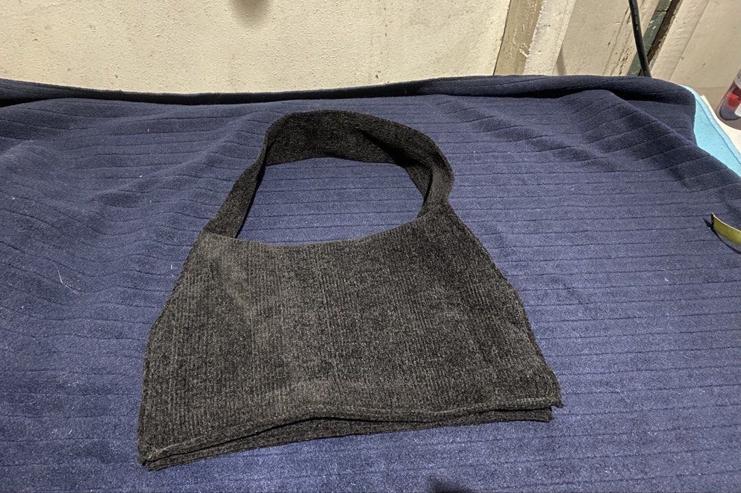 Black Knitted Shoulder Bag Tote (Category: Shoulder Bags) located in Manila. Submitted by resi.diaz (Listing ID 1470321407, Image 3). Description: - Color: Classic Black - Design: Simple, unstructured, and slouchy fit - Strap: Single wide strap for comfortable carrying - Storage: Deep main compartment for all your daily essentials - Condition: Like new with tag attached inside lining, clean with no tears or stains.