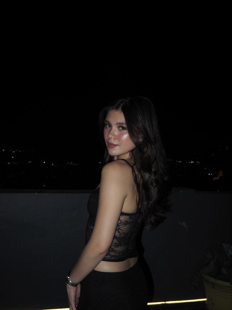 Black lace camisole sleeveless top (Category: Sleeveless) located in Marikina City. Submitted by maybe.ellie (Listing ID 1470277822, Image 2). Description: - Color: Black - Design: Sheer floral lace bodice with a solid black lower section - Straps: Delicate spaghetti straps - Fit: Fitted silhouette, lightweight material - Styling: Versatile piece for casual day wear or night outs.