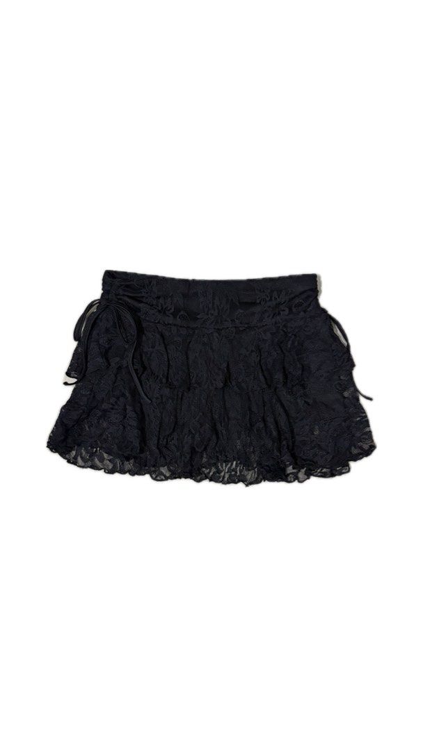 Black Lace Tiered Ruffle Mini Skirt with Drawstrings (Category: Skirts) located in Manila. Submitted by __lilith (Listing ID 1470267603, Image 1). Description: - Color: Black - Material: Delicate sheer lace fabric - Design: Tiered ruffle mini skirt with adjustable side drawstrings - Waistband: Comfortable elastic waistband - Styling: Great for layering or pairing with boots and oversized knits.