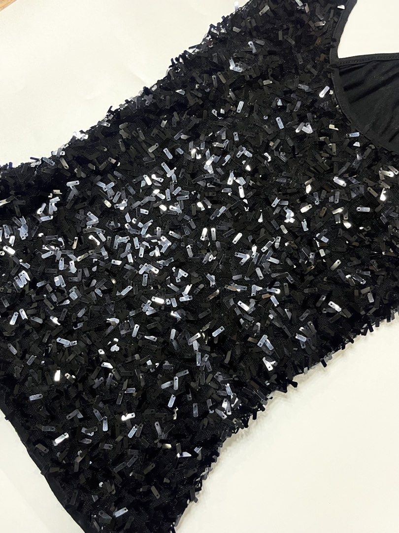 Black Sequined Camisole Top (Category: Sleeveless) located in Bayambang. Submitted by chailunaa (Listing ID 1470238310, Image 2). Description: Black Sequined Camisole Top size: small to med 📍pangasinan.
