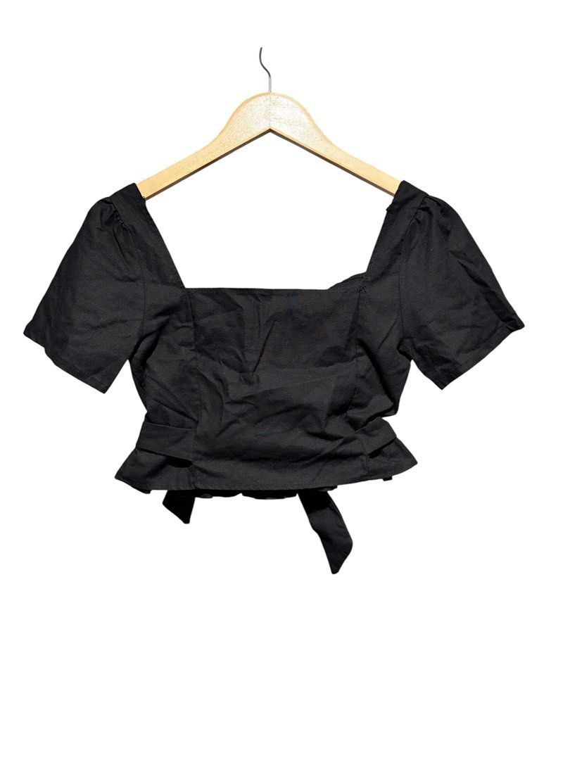 Black square neck crop top with tie front (Category: Blouses) located in Cavite. Submitted by grandearth.39df3f (Listing ID 1470150816, Image 1). Description: - Color: Black - Style: Crop top with short sleeves and square neckline - Fit: Stretchy smocked back panel for extra comfort - Details: Adjustable waist ties (front or back) and a cute ruffled hem - Condition: Worn a few times, still in solid shape - Pairing: Great with high-waisted jeans o