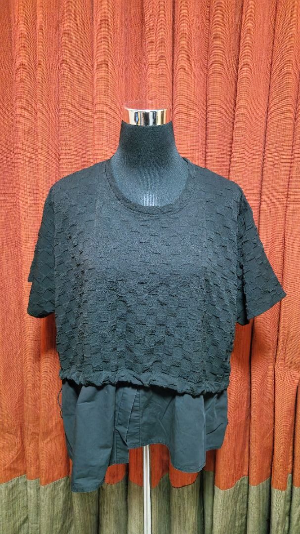 Black Textured Short Sleeve Top with Layered Hem Accent (Category: Blouses) located in Caloocan City. Submitted by mocs.stash (Listing ID 1470191402, Image 1). Description: Black Textured Short Sleeve Top with Layered Hem Accent Selling for ₱100 Condition: Preloved in great condition Price: ₱100 Shipping & Location Details: Location: Caloocan Shipping Fee: Paid by buyer Couriers: Grab Express, Lalamove, GoGo Xpress (GGX), or LBC Send a direct mes