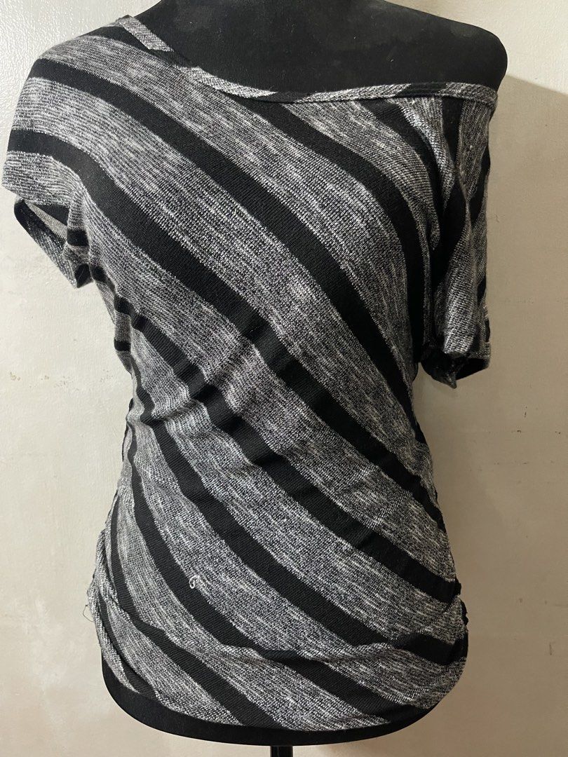 black top (Category: Others Tops) located in Manila. Submitted by themusecloset (Listing ID 1470248422, Image 1). Description: 🖤 BLACK & GRAY OFF-SHOULDER TOP FOR SALE! 🖤 💸 PRICE: ₱280 ONLY! 📏 SIZE: SMALL (S) ✨ Stylish black and gray stripes 🖤 Chic off-shoulder neckline 🌷 Unique lace details at the back 💋 Perfect for casual fits or a night-out look! #MuseCloset #AestheticTops #OffShoulderTop #AffordableFashion #ThriftFinds.