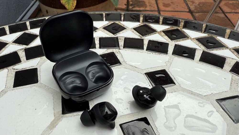 Black wireless earbuds with charging case (Category: Earphones) located in Manila. Submitted by tabilincai88708 (Listing ID 1470204596, Image 2). Description: Selling a pair of black wireless in-ear earbuds with a glossy finish and matching charging case. Compact, pocket-friendly, and in clean condition with very minimal signs of use. Grab them now!.