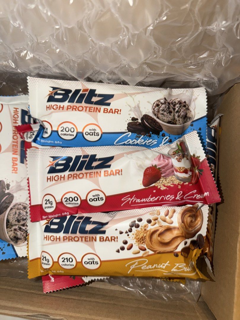 Blitz High Protein Bar Assorted Flavours (Category: Sports & Fitness Nutrition) located in Cagayan de Oro. Submitted by booksnclothes (Listing ID 1470209492, Image 1). Description: - Product: Blitz High Protein Bars Box - Flavors: Cookies & Cream, Strawberries & Cream, and Peanut Butter - Protein: 21g per bar with added oats - Weight: 64g per bar - Ideal for: Post-workout recovery or quick energy on-the-go Cookies and Cream: 3 pcs Strawberries an