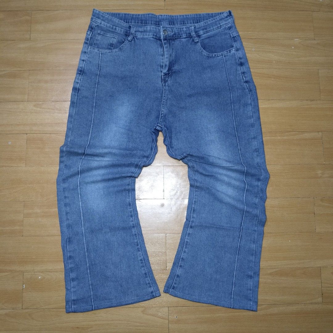 Blue Flare Denim Jeans (Category: Jeans) located in Manila. Submitted by usedtobeyours26 (Listing ID 1470330209, Image 1). Description: - Color/Wash: Blue denim, mid to light wash - Fit: Flare leg with trendy vertical front seam lines - Details: Standard five-pocket styling, belt loops, button closure, and zip fly - Back Pockets: Clean look with plain stitching - Style: Comfortable everyday casual wear Disclaimer: Product Color May Slightly Vary 
