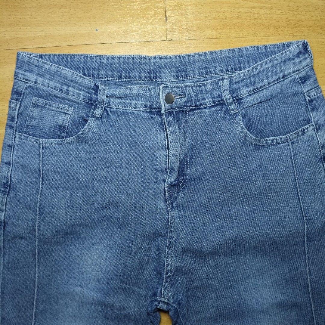 Blue Flare Denim Jeans (Category: Jeans) located in Manila. Submitted by usedtobeyours26 (Listing ID 1470330209, Image 3). Description: - Color/Wash: Blue denim, mid to light wash - Fit: Flare leg with trendy vertical front seam lines - Details: Standard five-pocket styling, belt loops, button closure, and zip fly - Back Pockets: Clean look with plain stitching - Style: Comfortable everyday casual wear Disclaimer: Product Color May Slightly Vary 