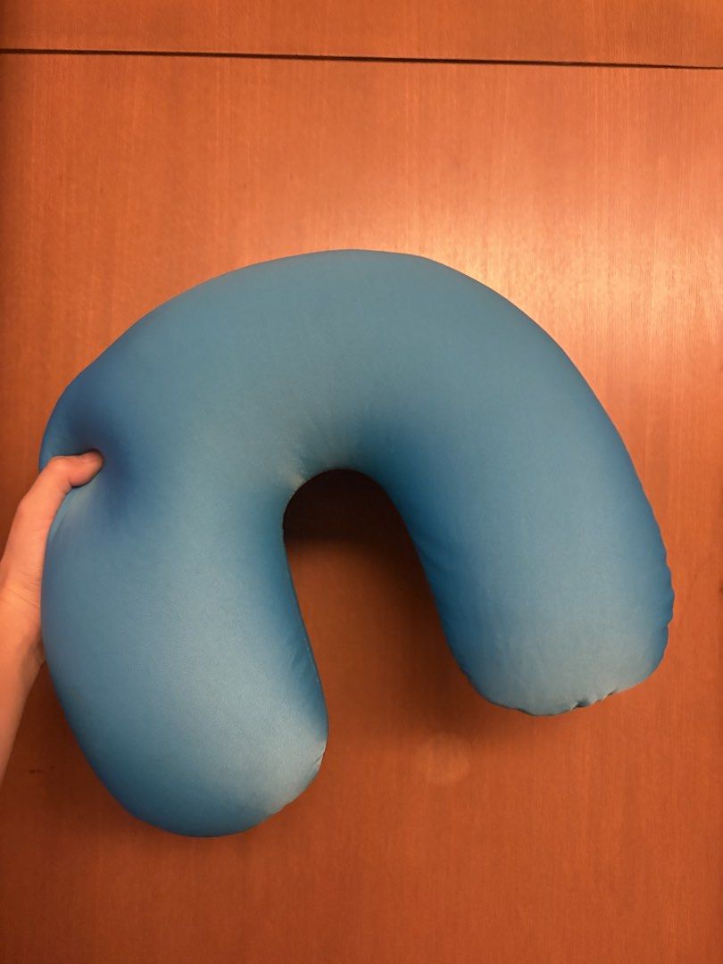 Blue Travel Neck Pillow U-shaped Support (Category: Travel Essentials & Accessories) located in Mandaluyong City. Submitted by dobypreloved (Listing ID 1470322265, Image 1). Description: - Color: Bright blue - Design: Ergonomic U-shape for neck support - Material: Soft fabric finish with squishy foam filling - Condition: Clean, no stains or marks - Best for: Long flights, road trips, and daily commutes.
