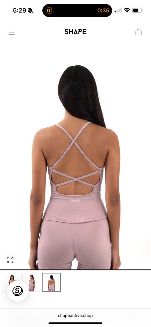 BNWT Shape Tone Cross Back Tank Top Rose Size S (Category: Sleeveless) located in Pasig City. Submitted by vanillaice__ (Listing ID 1470244032, Image 2). Description: - Brand New with tags - Color: Rose pink - Size: Small (Brand new with tags attached) - Design: Wrap front V-neck with trendy criss-cross straps in the back - Material: Soft, stretchy, and ultra-comfortable fabric - Details: Subtle brand logo printed near the lower back - Condition: