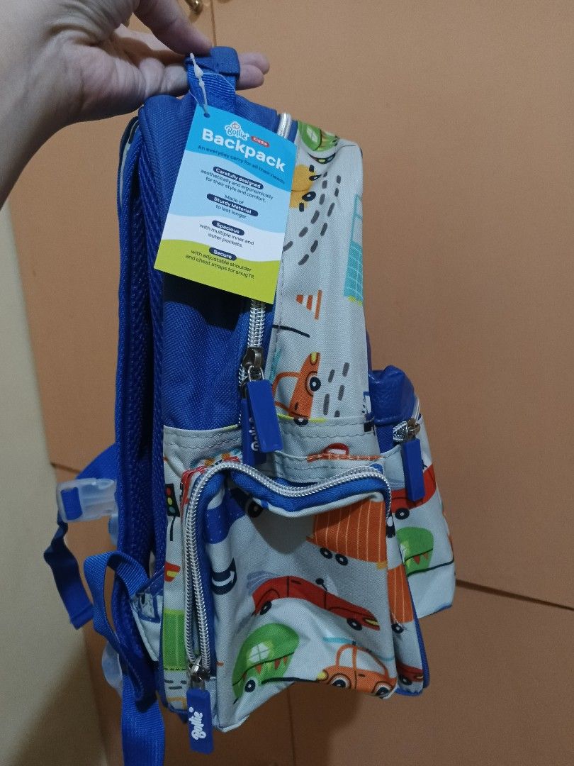 Bollie Kiddie Backpack Car Print (Category: Other Babies Going Out Needs) located in Lapu Lapu. Submitted by dawatkrist14304 (Listing ID 1470295804, Image 2). Description: - Brand new with tag attached - Fun, colorful cars, trucks, and road signs design on a light grey base - Vibrant blue trim, straps, and side pockets - Front zippered pocket for extra storage - Mesh padded back panel for breathability and comfort - Adjustable shoulder straps wit
