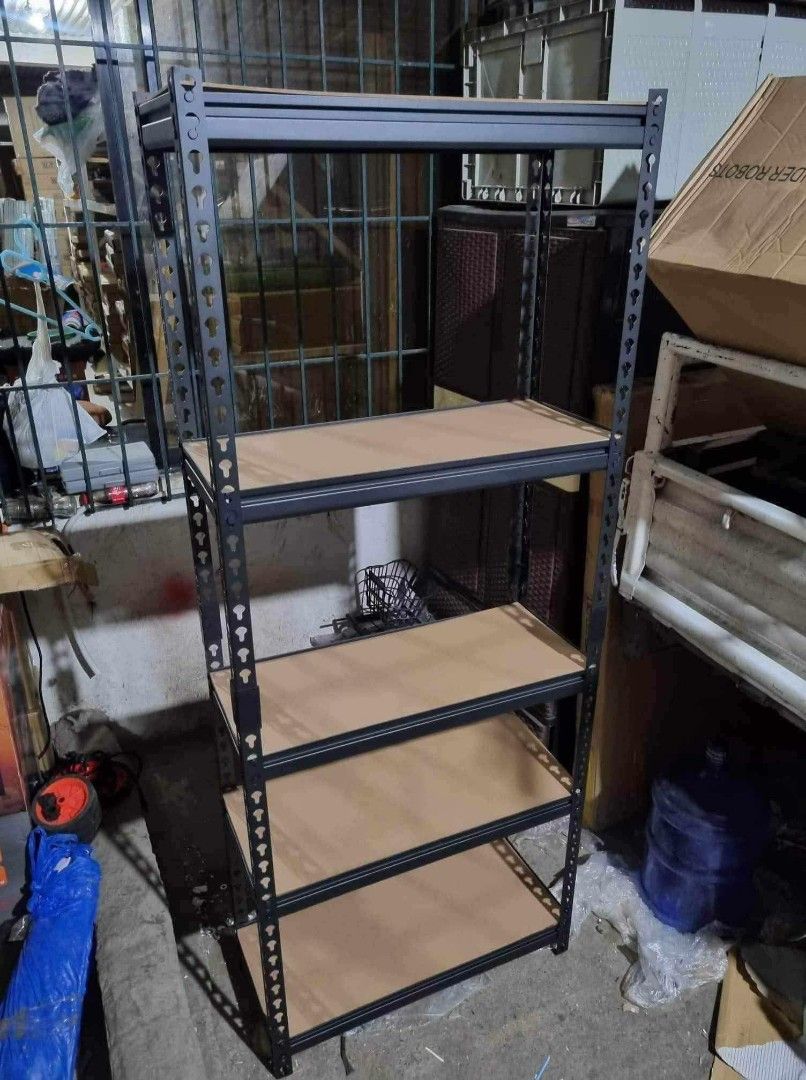 Boltless Metal Storage Rack 4-Tier Shelving Unit (Category: Shelves, Cabinets & Racks) located in Liloan. Submitted by oddflower_c197c6 (Listing ID 1470179160, Image 2). Description: LIGHT WEIGHT BOLTLESS RACK❗️ DIMENSIONS: 30X90X150CM (5LAYER) Rs 1,499 30X90X150CM (4LAYER) Rs 1299 30X70X150CM (5LAYER) Rs 1,350 30x70x150CM (4LAYER) Rs 1,250 Available colors: WHITE BLACK.