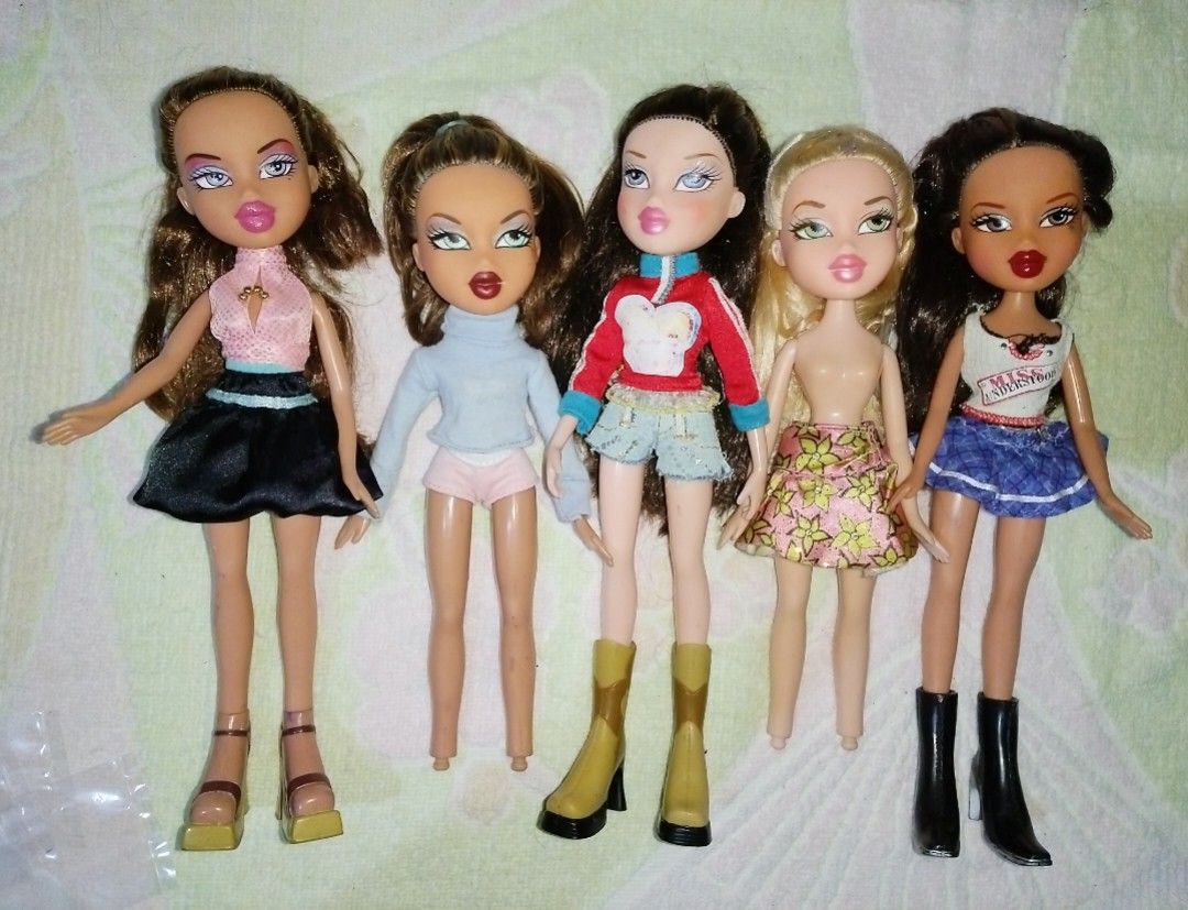 Bratz bundle (Category: Kids Toys) located in Goa. Submitted by liz1104 (Listing ID 1470294967, Image 1). Description: MGA Entertainment produced dolls. No cracked neck No bitemarks No broken limbs nor glued parts Flaw: some penmarks - can be removed by benzac Minor paint chip on Yasmine shoes Selling as is Gcash First to pay Sf on buyer's exprense.