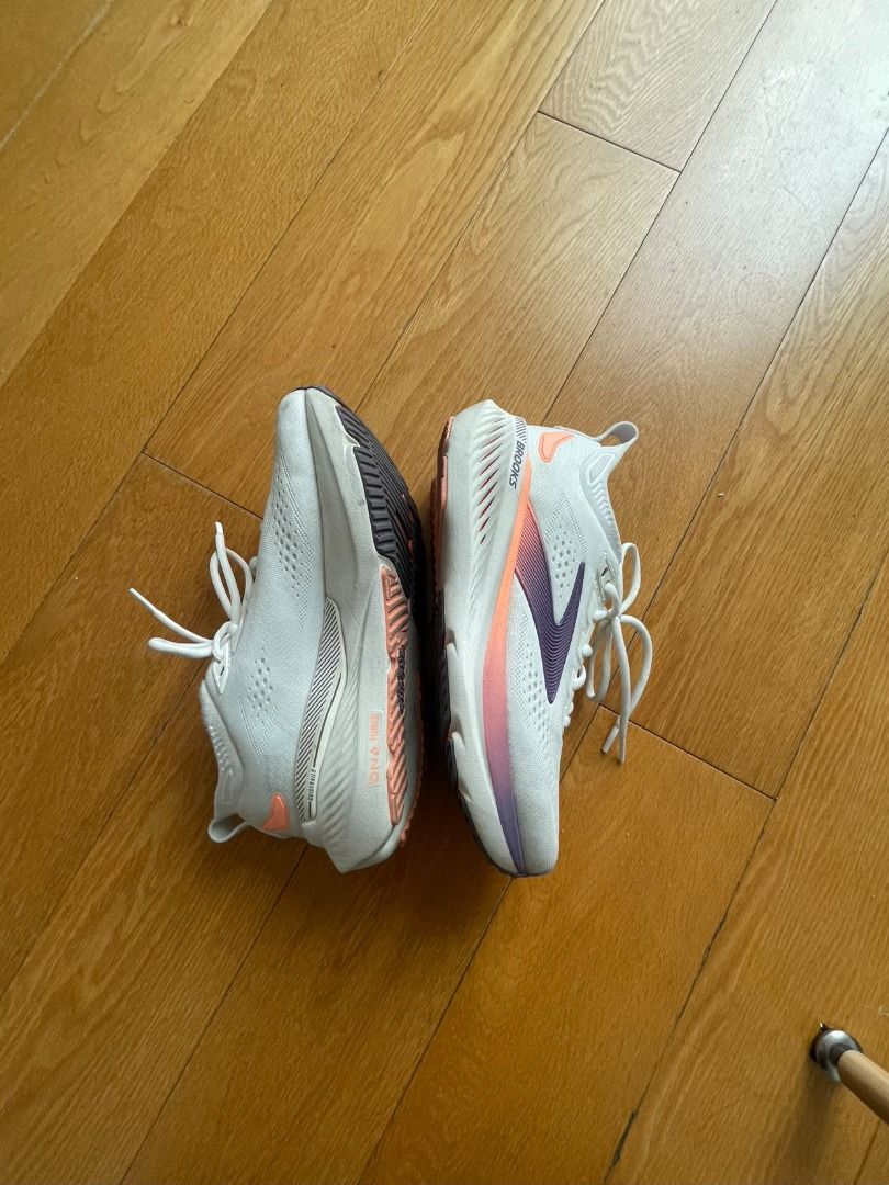 Brooks Ghost running shoes white purple size 8.5 (Category: Sneakers) located in Pasig City. Submitted by mimosaaas (Listing ID 1470199049, Image 1). Description: - Brand: Brooks Glycerin - Color: White with purple and peach accents - Size: Women's US 8.5 / EUR 40 / UK 6.5 - Features: Lightweight mesh upper, cushioned sole, durable rubber outsole, clean white laces - Condition: Worn a few times, minimal wear on soles, very clean RFS: Impulse buy.