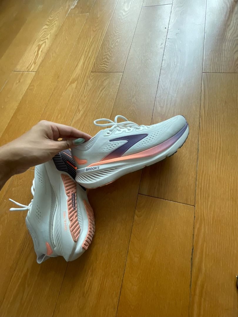 Brooks Ghost running shoes white purple size 8.5 (Category: Sneakers) located in Pasig City. Submitted by mimosaaas (Listing ID 1470199049, Image 2). Description: - Brand: Brooks Glycerin - Color: White with purple and peach accents - Size: Women's US 8.5 / EUR 40 / UK 6.5 - Features: Lightweight mesh upper, cushioned sole, durable rubber outsole, clean white laces - Condition: Worn a few times, minimal wear on soles, very clean RFS: Impulse buy.