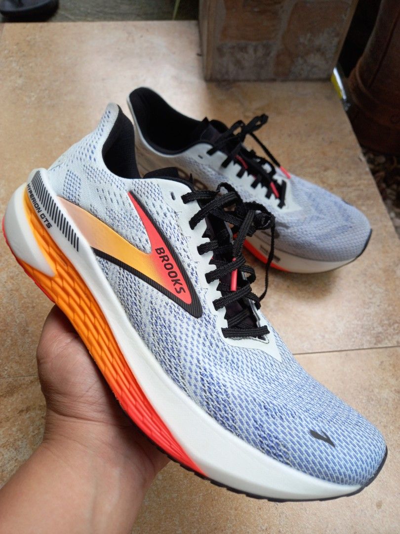Brooks Hyperion GTS Running Shoes (Category: Sneakers) located in Davao. Submitted by kirk214red-50020 (Listing ID 1470217014, Image 1). Description: - Brand: Brooks Hyperion GTS Performance Running Shoes - Colorway: White with striking orange and red gradient midsoles and black laces - Cushioning: DNA FLASH nitrogen-infused tech for lightweight responsiveness - Upper: Breathable engineered mesh with supportive Go To Support side stripes - Condit