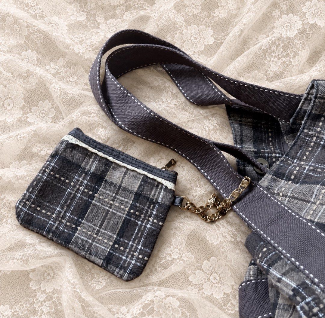 Brown plaid canvas shoulder bag with matching pouch (Category: Shoulder Bags) located in Manila. Submitted by calliope777 (Listing ID 1470214537, Image 3). Description: - Stylish brown plaid canvas shoulder bag - Spacious main compartment with secure magnetic button closure - Convenient inner zipper pocket and side pockets for organization - Durable, thick fabric straps featuring contrast stitching - Includes a cute matching zippered pouch attach