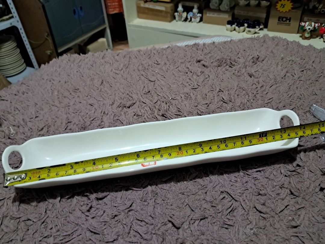 Buffet cuddy (Category: Dinnerware & Cutlery) located in Cavite. Submitted by secretjapansurplus (Listing ID 1470248496, Image 2). Description: 50 pesos each 12 pcs available Vintage Porcelain Buffet Flatware Caddy Description: This is an elegant, vintage-style white porcelain buffet flatware caddy, explicitly designed to organize and beautifully present silverware (forks, knives, or spoons) on a banquet table or buffet line. It features a sleek,