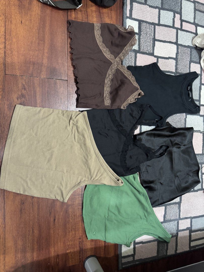 Bundle party tops (Category: Sleeveless) located in Quezon City. Submitted by peanutsquash (Listing ID 1470224664, Image 1). Description: - Bundle of 6 party/going out tops - Full set for 900 all 6 tops!! (A steal i promise 🤞🏻 all good qual and branded tops!!) - If you want to buy individually: - H&M brown/black lace top: 150 each - PINK Victoria secret green one shoulder: 350 (best qual among all of them imo!! Has a built in pad) - Black satin