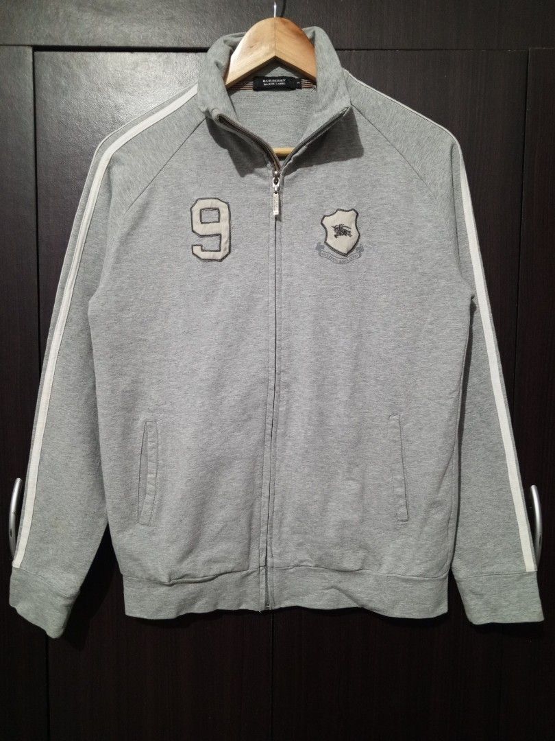 Burberry Black Label grey Full-zip Track Jacket (Category: Luxury Apparel) located in Santa Maria. Submitted by paulo-garcia21 (Listing ID 1470263852, Image 2). Description: size 3 on tag 19 by 25 best fit small mens med womens excellent condition minimal stain on stripes.