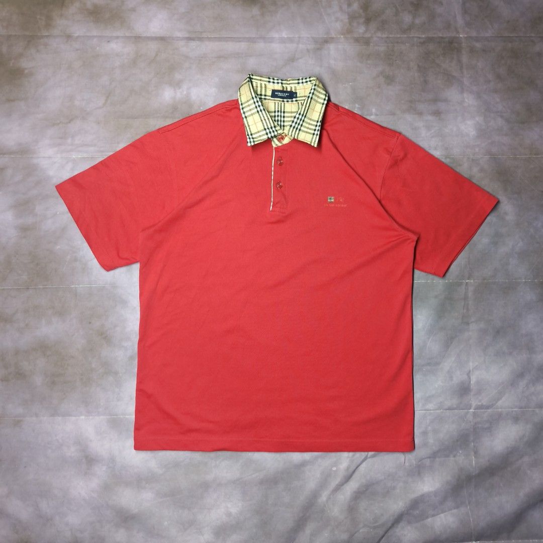 Burberry London Nova Check Collar Polo (Category: Tshirts & Polo Shirts ) located in San Jose. Submitted by dripdropph22 (Listing ID 1470160879, Image 2). Description: Burberry London short-sleeve polo shirt 399+sf Burberry London 2000s Nova Check Collar Polo This piece represents the iconic British heritage aesthetic popularized by Burberry London during the early 2000s. Featuring the signature Nova check pattern along the collar and inner plack