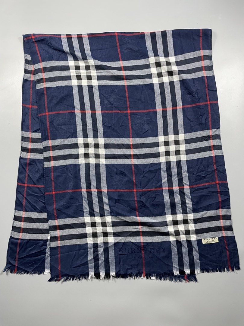 Burberry plaid shawl Navy blue (Category: Luxury Accessories) located in Taguig. Submitted by _curatedfits (Listing ID 1470317707, Image 1). Description: Burberry plaid shawl Navy blue Width 27” Length 62” No flaws - 1,100 Dm! .