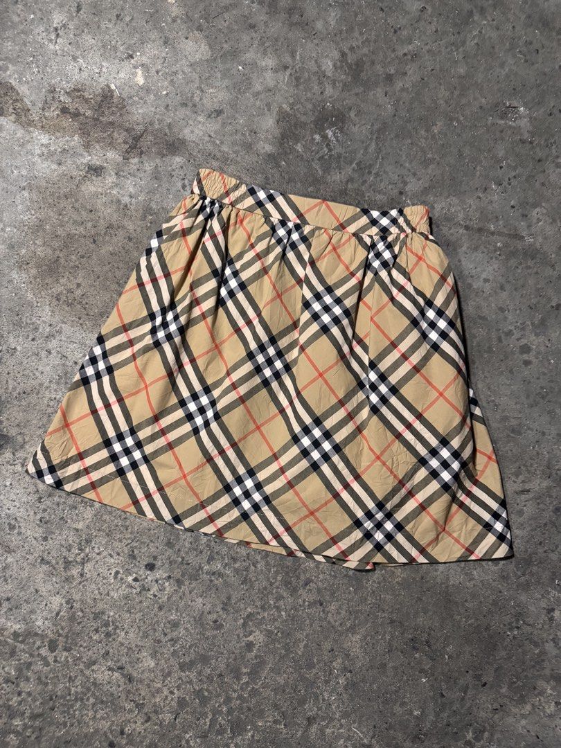 Burberry skirt (Category: Skirts) located in Pasig City. Submitted by dripthrift1600 (Listing ID 1470321865, Image 1). Description: - Burberry Skirt - Good condition - Issue: None - Sizes: M - Dimes: 26x18 .