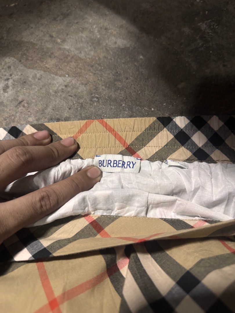 Burberry skirt (Category: Skirts) located in Pasig City. Submitted by dripthrift1600 (Listing ID 1470321865, Image 3). Description: - Burberry Skirt - Good condition - Issue: None - Sizes: M - Dimes: 26x18 .