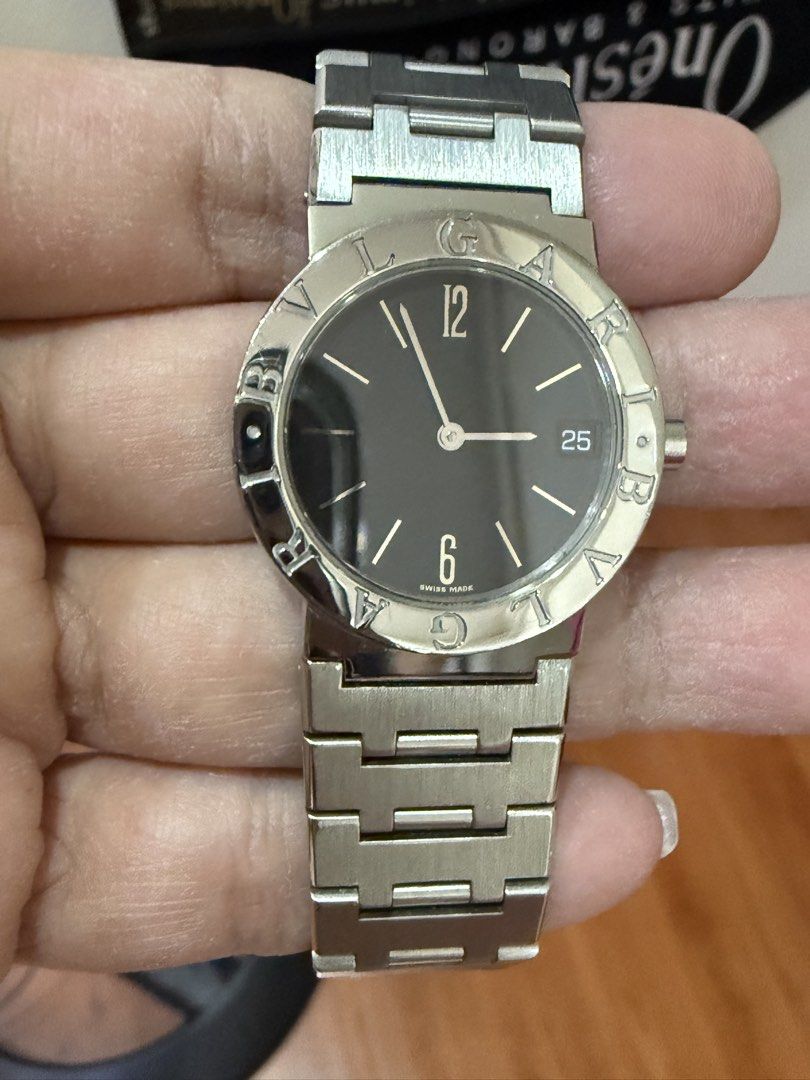 Bvlgari Bb (Category: Luxury Watches) located in Manila. Submitted by elledp (Listing ID 1470277536, Image 1). Description: - Brand: Bvlgari BB 30 SSD - Dial: Classic black with silver-tone markers and Arabic numerals at 12 and 6 o'clock - Features: Date window located at the 3 o'clock position - Details: Official Bvlgari logo stamped on the clasp and engraved on the case back - Condition: 100% authentic, well-maintained, and ready to wear.