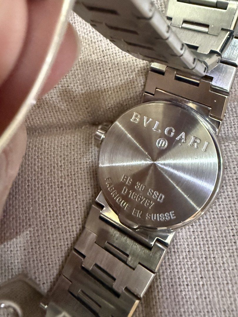 Bvlgari Bb (Category: Luxury Watches) located in Manila. Submitted by elledp (Listing ID 1470277536, Image 2). Description: - Brand: Bvlgari BB 30 SSD - Dial: Classic black with silver-tone markers and Arabic numerals at 12 and 6 o'clock - Features: Date window located at the 3 o'clock position - Details: Official Bvlgari logo stamped on the clasp and engraved on the case back - Condition: 100% authentic, well-maintained, and ready to wear.