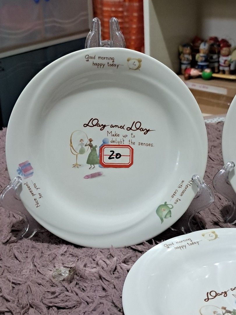 Cake plate (Category: Dinnerware & Cutlery) located in Cavite. Submitted by secretjapansurplus (Listing ID 1470238363, Image 2). Description: 20 each 5 pcs available This is a charming 6.5-inch ceramic small plate (platito) featuring whimsical lifestyle illustrations and sweet English phrases like "Good morning happy today" and "Afternoon tea with cake." With its flat, wide design, it is perfect for serving snacks, desserts, sides, or using as a 