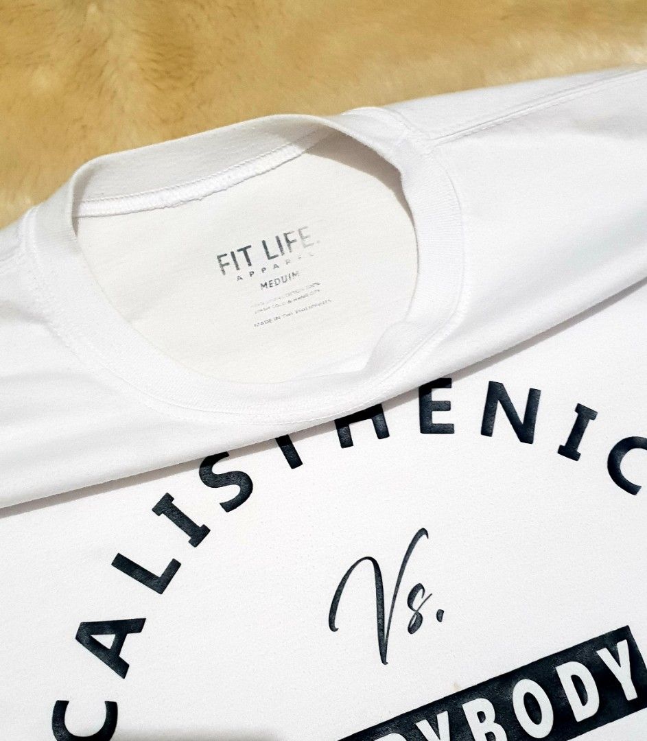 Calisthenics Vs. Everybody (Category: Tshirts & Polo Shirts ) located in Taguig. Submitted by wethrifting2021 (Listing ID 1470282746, Image 3). Description: Item: Calisthenics vs. EveryBody🔥 Size: OPT Fit Life Apparel (M) Width: 19 Length: 26 Condition: Excellent Issue: Minimal Lints // Due stain // Need wash SWIPE MORE DETAILS. DM to purchase 📩.