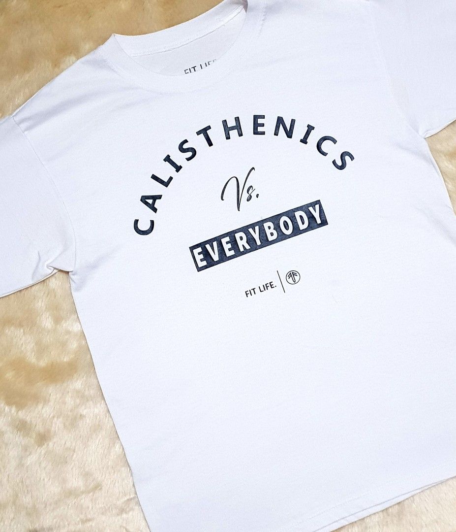 Calisthenics Vs. Everybody (Category: Tshirts & Polo Shirts ) located in Taguig. Submitted by wethrifting2021 (Listing ID 1470282746, Image 2). Description: Item: Calisthenics vs. EveryBody🔥 Size: OPT Fit Life Apparel (M) Width: 19 Length: 26 Condition: Excellent Issue: Minimal Lints // Due stain // Need wash SWIPE MORE DETAILS. DM to purchase 📩.