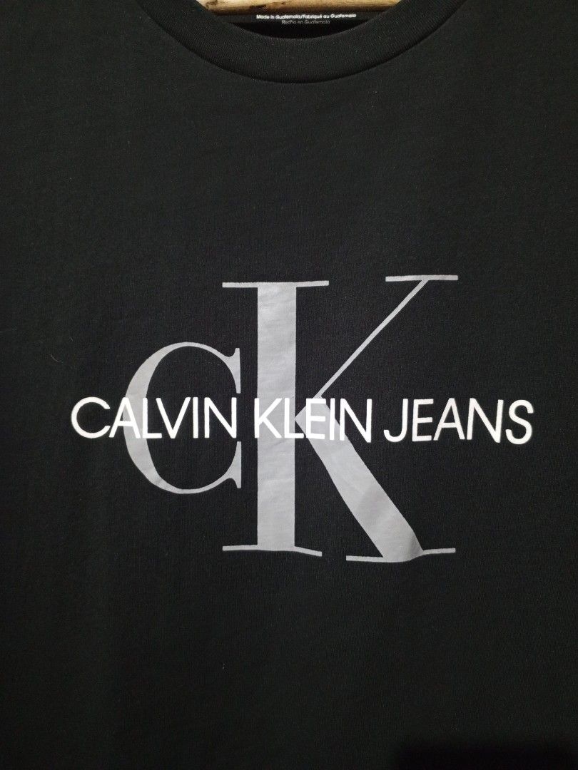 Calvin Klein Jeans Monogram Logo Tee (Category: Tshirts & Polo Shirts ) located in Santa Maria. Submitted by paulo-garcia21 (Listing ID 1470267793, Image 2). Description: large on tag 20.5 by 27.5 excellent condition no flaws.