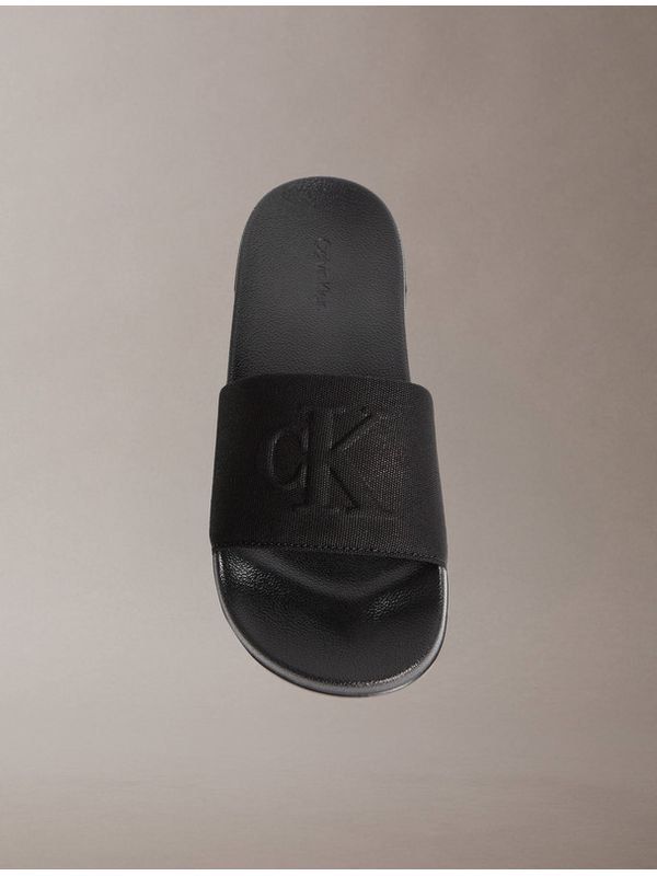 Calvin Klein Monogram Slides Black 26cm (Category: Slippers and slides) located in Santa Rosa. Submitted by miqboutique (Listing ID 1470186099, Image 3). Description: CK Monogram Slides 8US Womens(26cm) w/ paperbag ₱2,499 + SF • Ready to ship • Guaranteed Original Fb page: Miq's Boutique.
