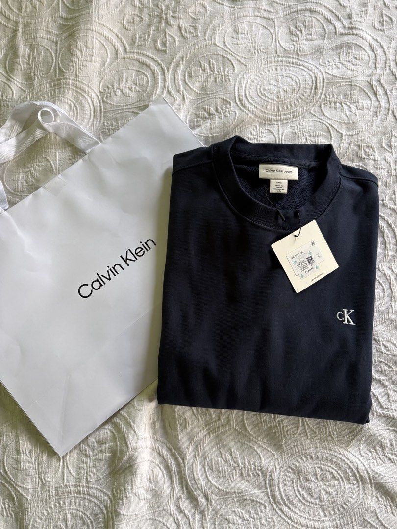 Calvin Klein Sweater (Category: Coats, Jackets and Outerwear) located in Cainta. Submitted by shoptrouvailles (Listing ID 1470177152, Image 1). Description: Brand New Fs: CK Sweater Color: Navy Blue Size: Small But Fit To Medium ₱5,495 Selling it Low.