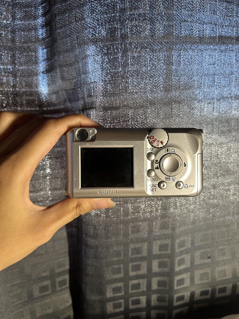 CANON A430 UNIT ONLY! (Category: Cameras) located in Muntinlupa City. Submitted by kyaaahaan1 (Listing ID 1470300395, Image 3). Description: CANON POWERSHOT A430 ₱1300 UNIT ONLY!! Photos with people are blurred for privacy purposes! (message for additional photos & infos) Unit info: 2 AAbatteries (disposable/rechargeable) Maximum of 2g SD card only No need for charging Issue: * Light sensitivity, photo may appear very bright when shot outdoors/da