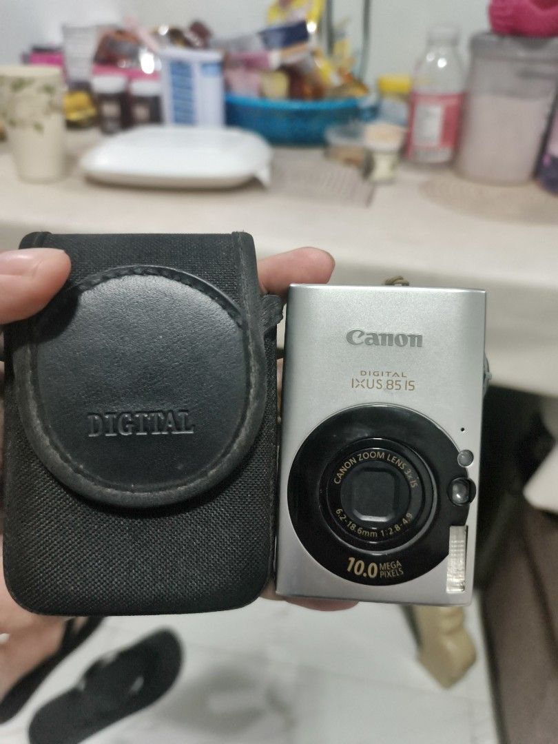 Canon Digital IXUS 85 IS 10.0 Megapixels (Category: Cameras) located in Manila. Submitted by jenmelvin001795 (Listing ID 1470300478, Image 2). Description: 👉 no issue bilhan nyu lng sd card ✅10 megapixel ✅flash ✅zoom in / out ✅view finder inclusion ✅hard pouch ✅strap ✅battery.