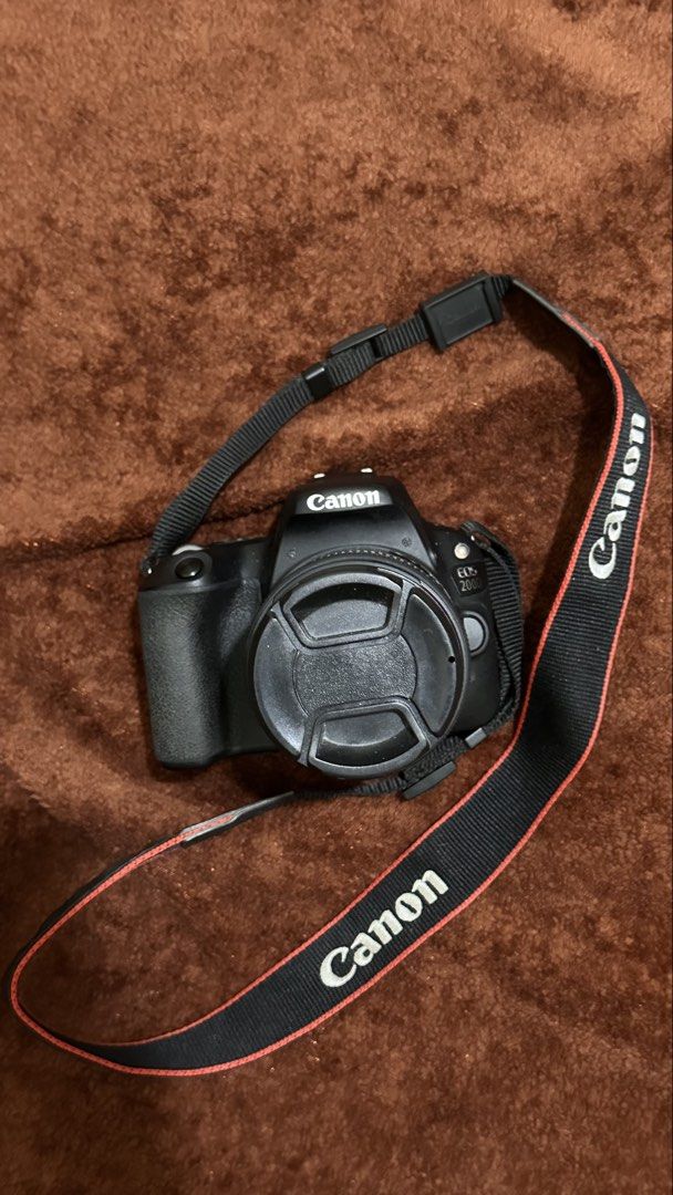Canon EOS 200D (Category: Cameras) located in Manila. Submitted by liaaaahx (Listing ID 1470213064, Image 1). Description: 📸 FOR SALE: CANON EOS 200D + 18–55mm KIT LENS INCLUSIONS: ✔️ Canon EOS 200D camera body ✔️ Canon EF-S 18–55mm kit lens ✔️ Battery ✔️ Battery charger ✔️ Camera bag CAMERA SPECS: • 24.2MP APS-C CMOS Sensor • DIGIC 7 Image Processor • Dual Pixel CMOS AF • 3.0” Vari-Angle Touchscreen LCD • Full HD 1080p Video Recording • Built-i