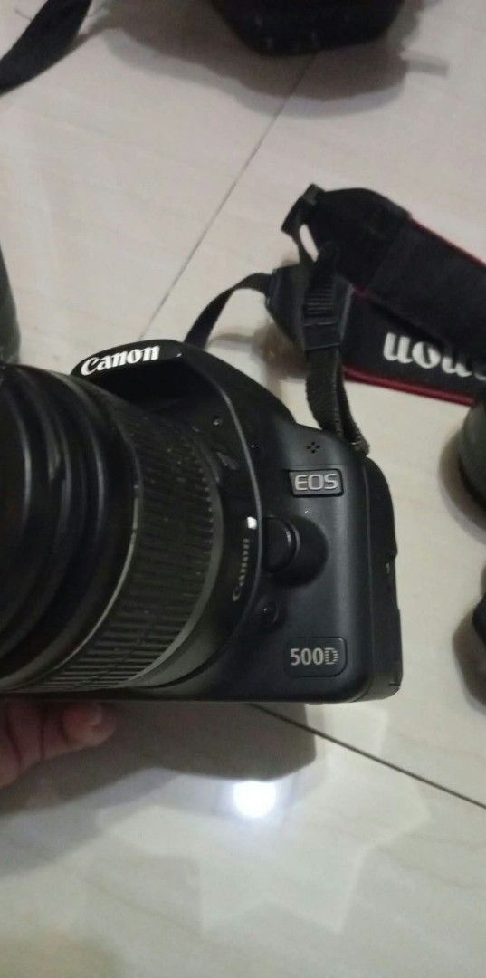 Canon EOS 500D DSLR Camera Bundle with Lenses and Bags (Category: Cameras) located in Bulacan. Submitted by mamijinky (Listing ID 1470159169, Image 2). Description: - Camera: Canon EOS 500D DSLR body with strap (tested and working great) - Lenses: 50mm prime lens and a telephoto zoom lens - Storage: Includes two camera bags for easy gear transport - Perfect For: Photography projects, street shoots, and travel - Note: All items shown in the pictur